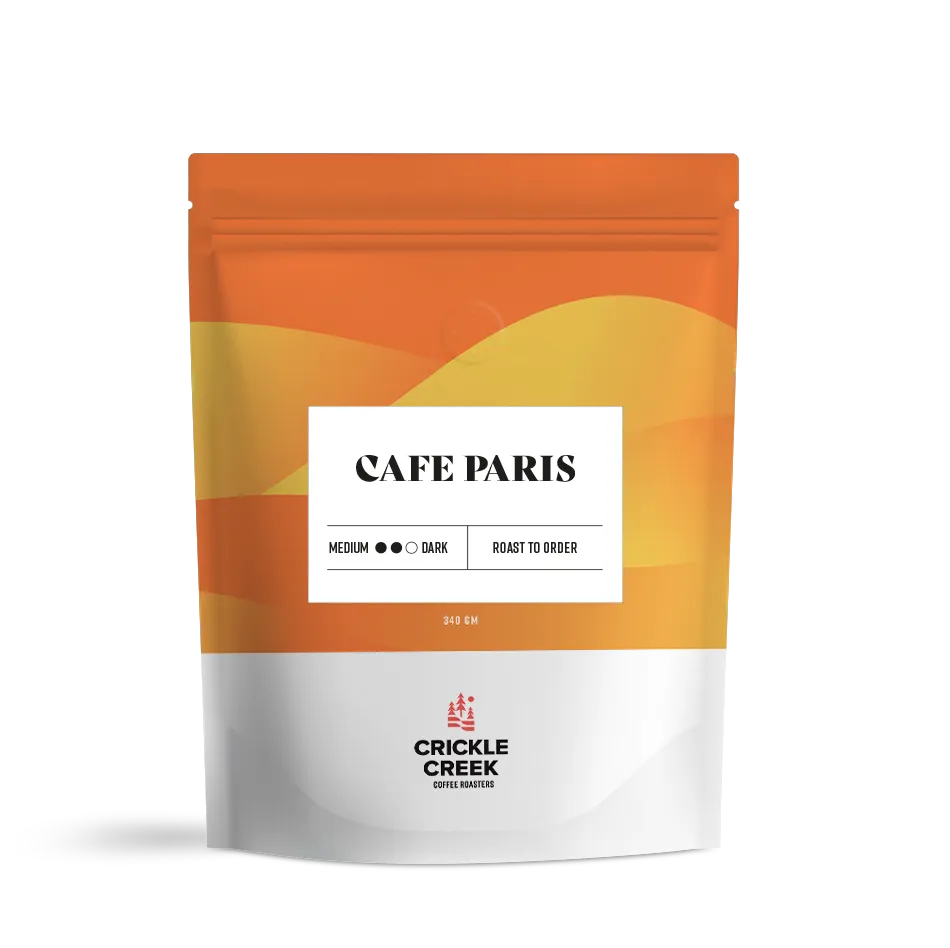 Specialty coffee blend bag labeled 'Cafe Paris'; curated and roasted by Crickle Creek Coffee.